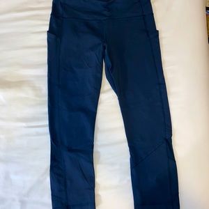Lululemon navy pace rival crops